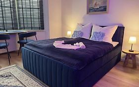CuxHeaven - modernes Studio-Apartment direkt am Meer mit 65 Zoll TV und Tiefgarage in Duhnen